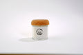 TOBIE Ritual Flame No. 11 aromatic candle in a glass jar with cork lid