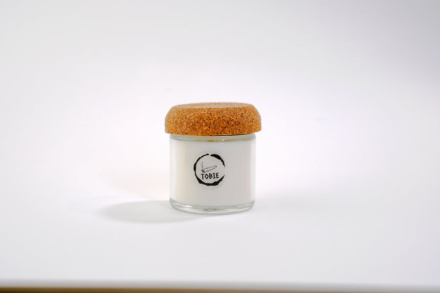 TOBIE Ritual Flame No. 11 aromatic candle in a glass jar with cork lid